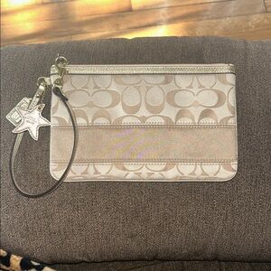 Coach Signature Tan Canvas Gold Metallic Wristlet. EUC